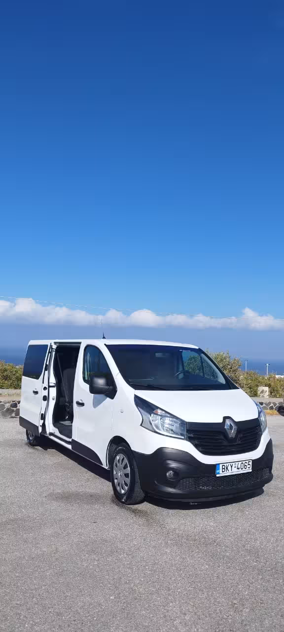 Modern white minivan ready for shared transfer service, convenient airport to hotel shuttle on Santorini