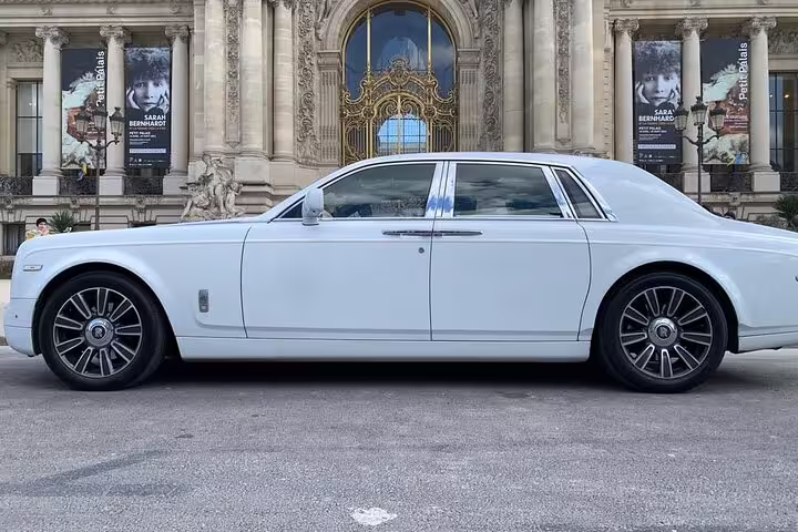 White Rolls Royce Phantom parked in front of the Petit Palais in Paris