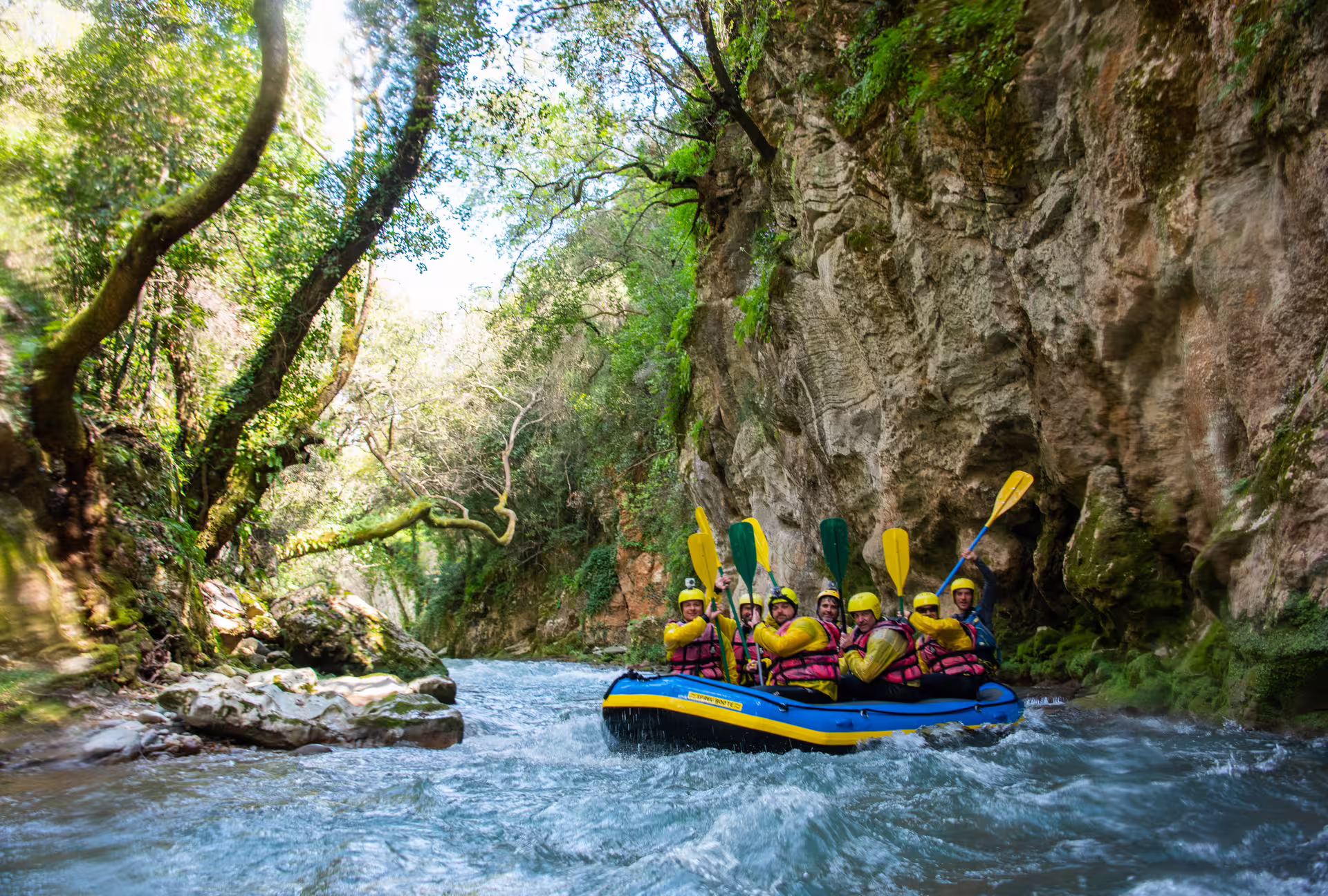 White-water rafting on the Lousios and Alfeios rivers through a rocky gorge in Peloponnese, Greece adventure trip