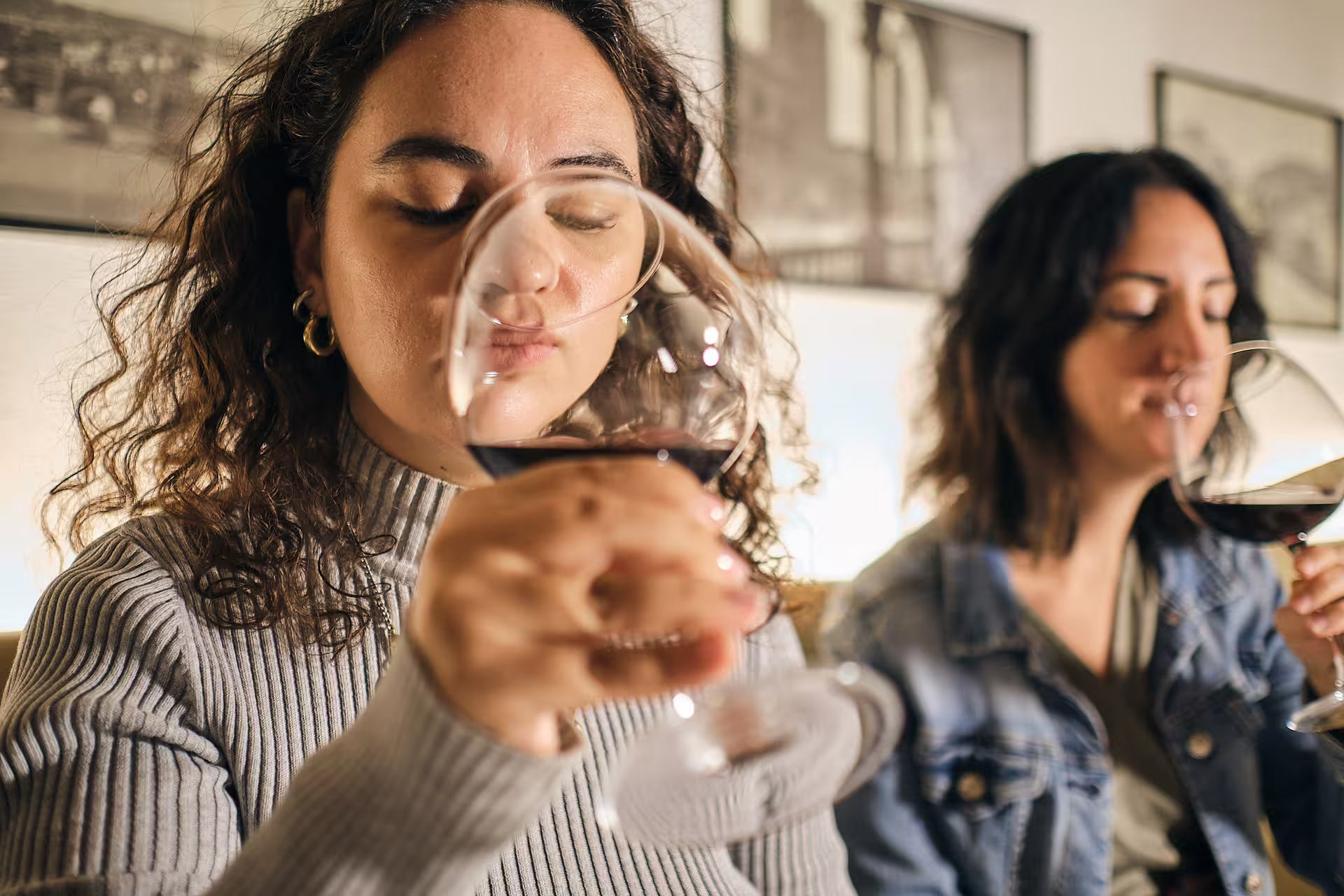 Guests savor red wine aromas on a Verona wine tasting near Juliet’s House in a cozy local enoteca