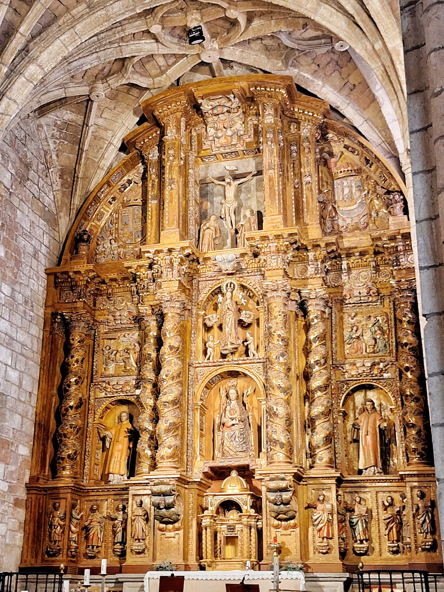 Intricate wooden altar in a historic church on the Sequoia Forest and San Vicente de la Barquera tour.