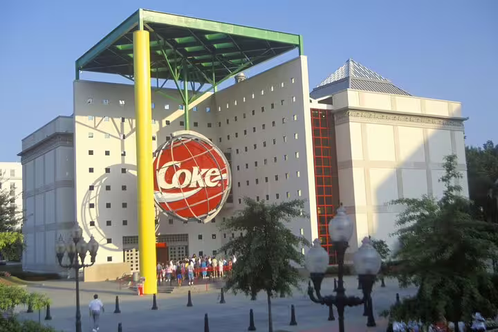 World of Coca-Cola museum exterior with large Coke globe sign in downtown Atlanta