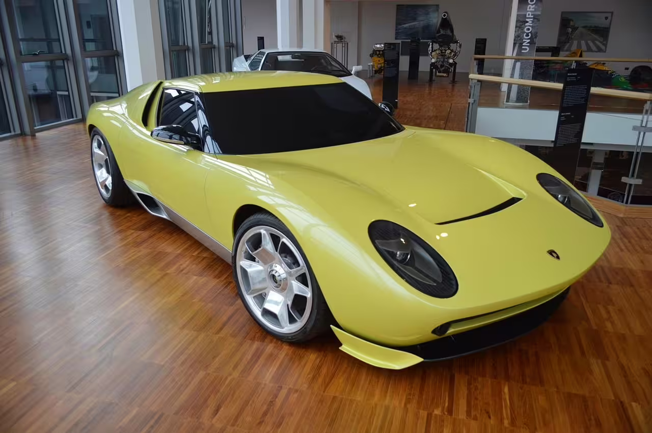 Experience the sleek design of a yellow Lamborghini sports car at the Lamborghini Museum in Bologna.