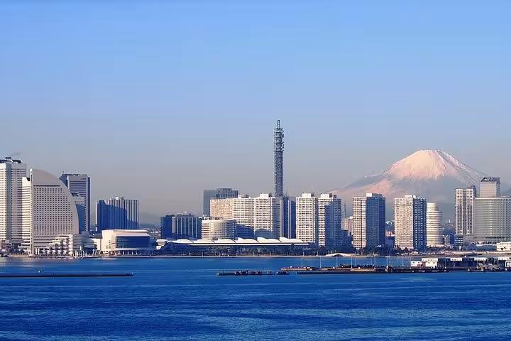 Panoramic skyline of Yokohama with Mt. Fuji in the background, highlighting the beauty of Japan's iconic landmarks.