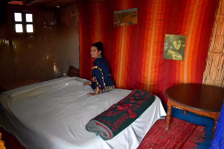 Guest room in Zagora desert camp with double bed, ideal for private 2-day Marrakech to Zagora tour