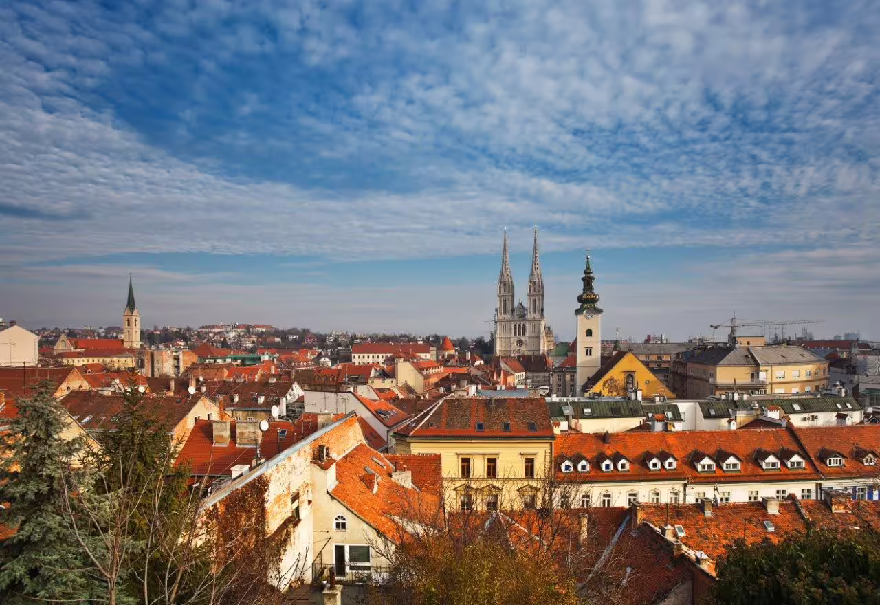 Panoramic Zagreb skyline with red roofs and cathedral spires, highlight of Croatia 11-day self-drive tour