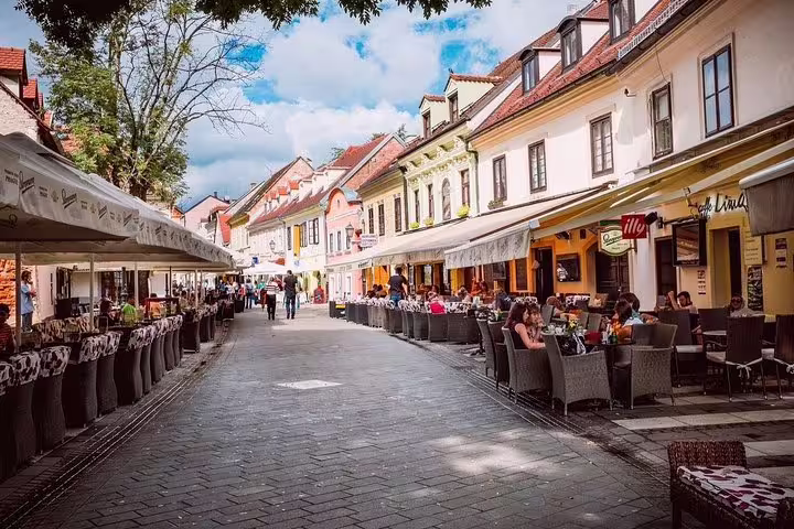 Zagreb city tour stroll along Tkalčićeva Street with outdoor cafes and colorful facades in the Old Town