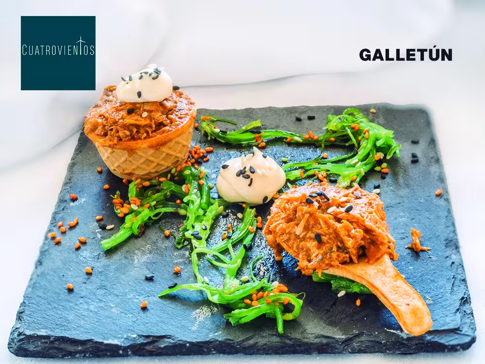 Gourmet tuna dish garnished with greens and sesame seeds at Zahara Tuna Festival Day Trip.