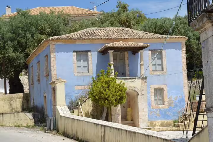 Traditional blue village house in southern Zakynthos, cultural stop on half-day beaches and scenic view tour