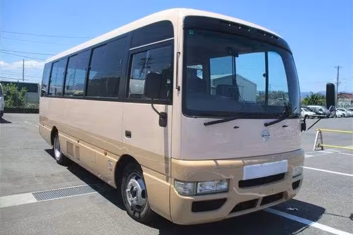 Private shuttle bus for Zanzibar Airport transfers to East Coast hotels, offering comfortable and reliable transport.