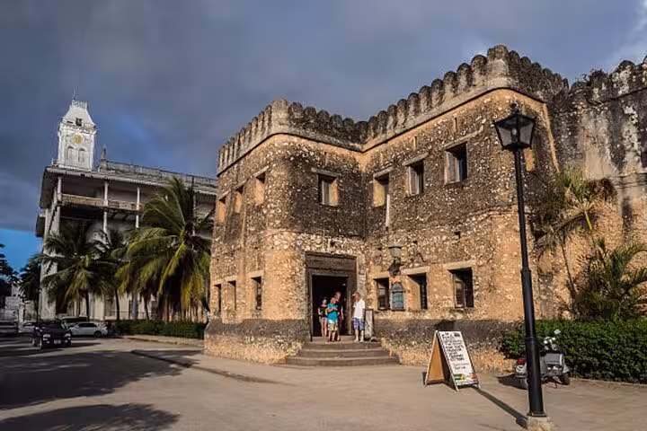 Visit the ancient Arab Fort in Zanzibar's Stone Town, a highlight of the private walking tour experience.