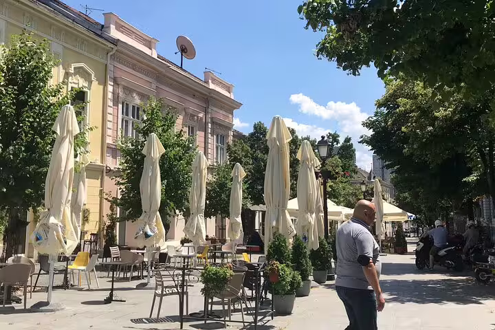 Sunny Zemun promenade cafes and historic facades on a private Belgrade and Old Zemun walking tour
