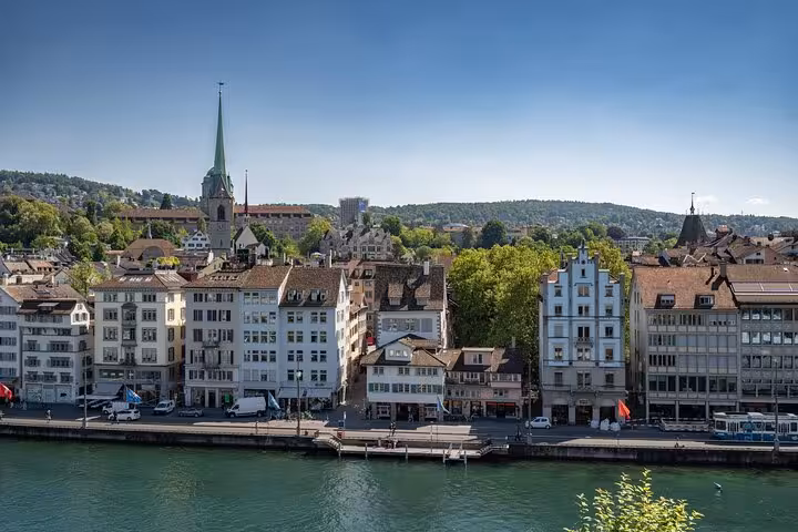 Zurich Limmat River waterfront skyline and church spire, Zurich 360 city walk tour hidden spots